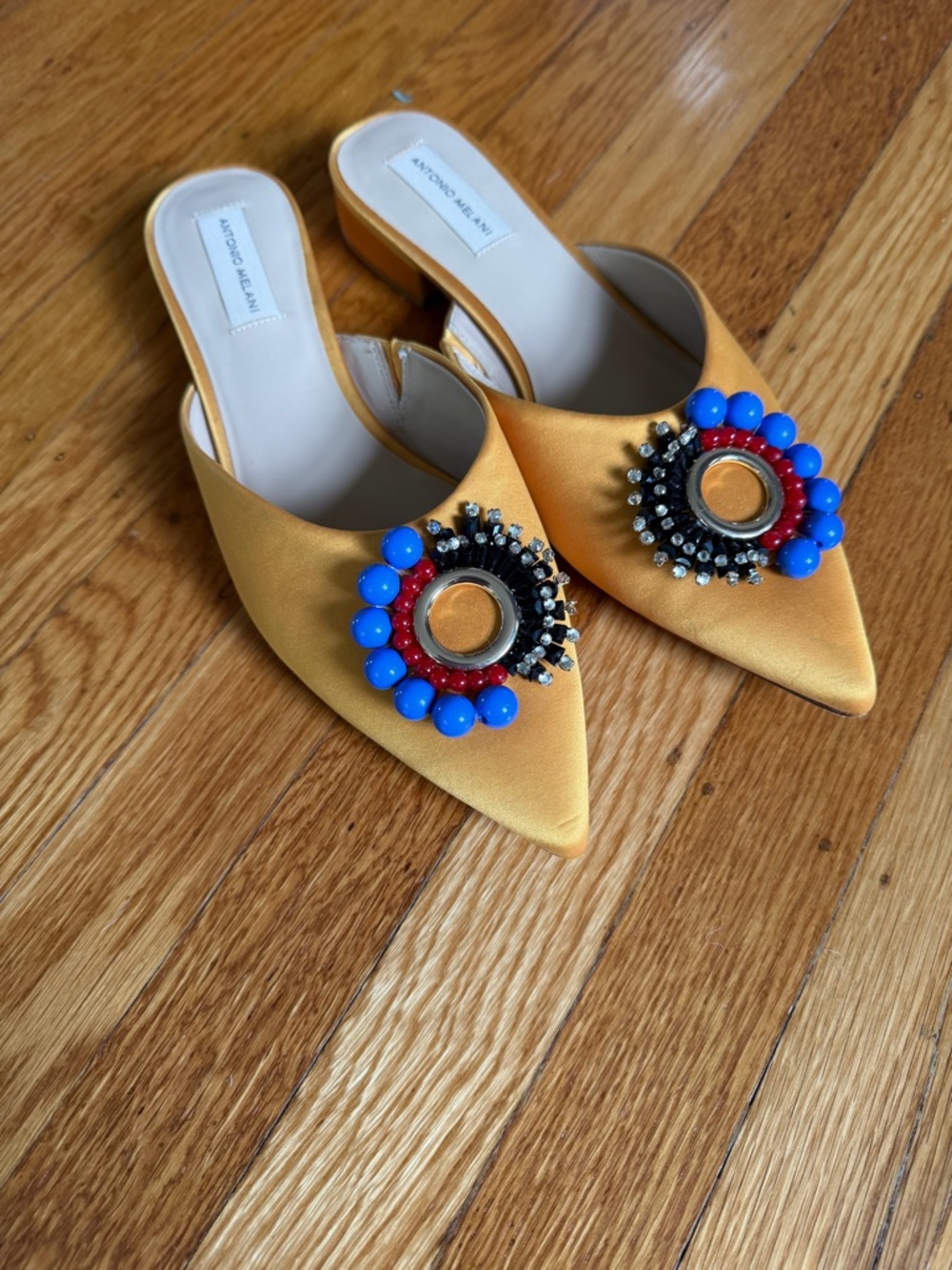 ANTONIO MELANI Gold Pointed-Toe Satin Mules with Embellished Medallions